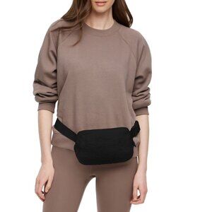 GapFit sherpa belt bag in cream color. Super soft fleece with exterior and inter